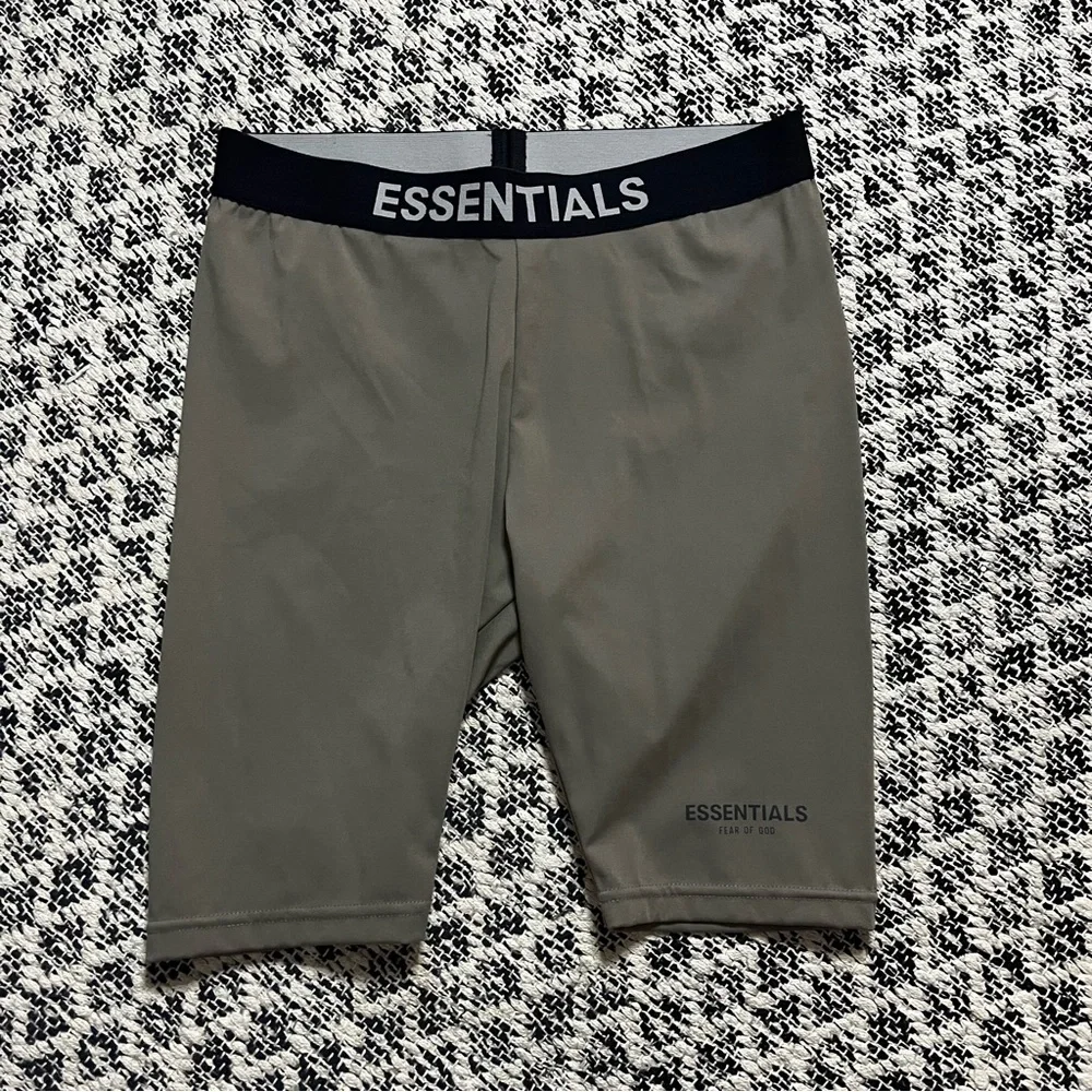 Fear of God Essentials Athletic Biker Short in Pistachio Size XS